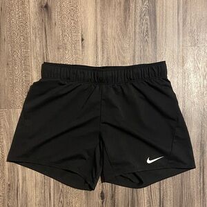 Nike Women's Black Athletic Running Shorts with White Swoosh